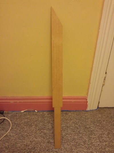Piece of MDF cut out in the shape of the sword