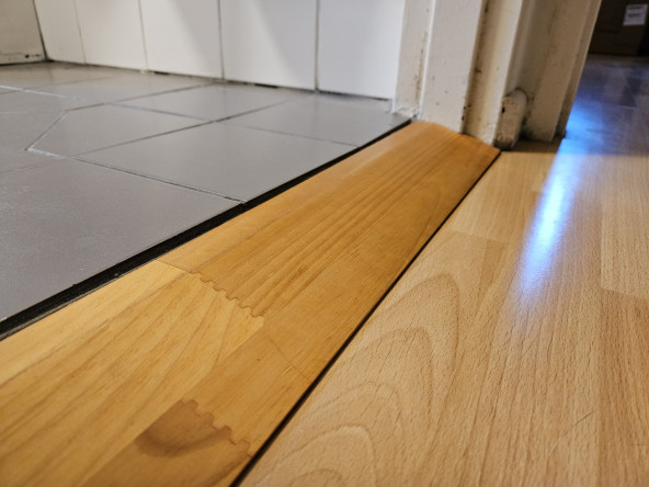 A small ramp between two floor surfaces