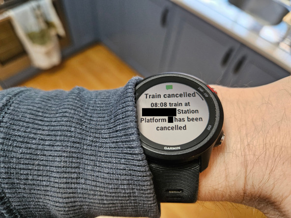 A notification on my Garmin smartwatch, stating that my train has been cancelled