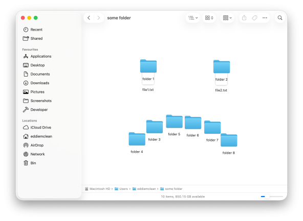 A Finder window with the icons arranged into a frowny face
