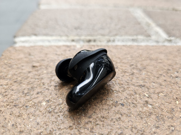 Close-up of one earbud