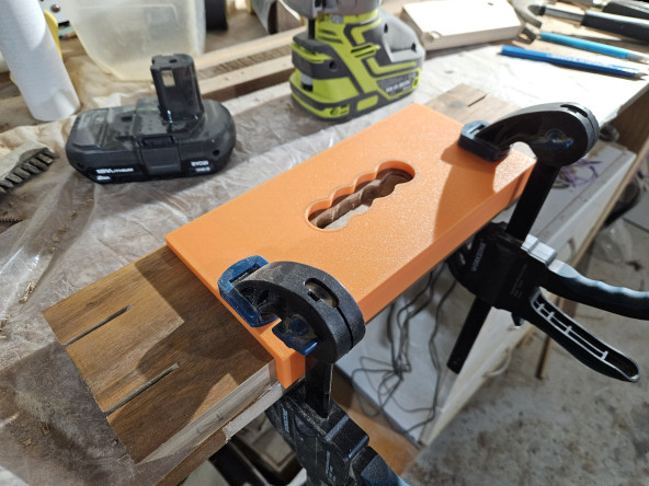 Handhold template, clamped to the workpiece