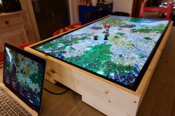 A TV mounted horizontally in a wooden frame