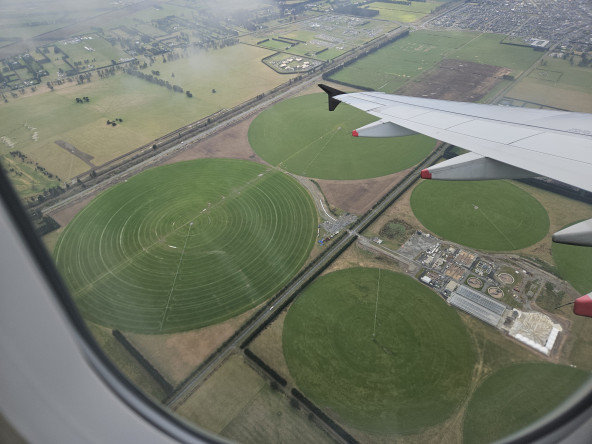 Circular farm fields, seen from plane window